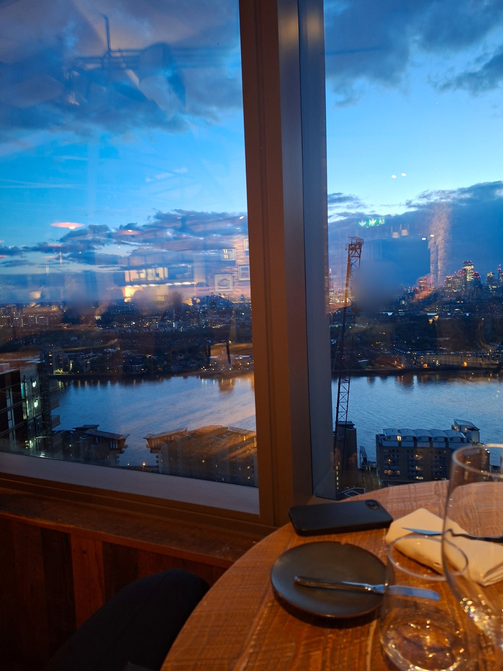 canary wharf london skyline with ada rose ebony escort/ dinner date companion